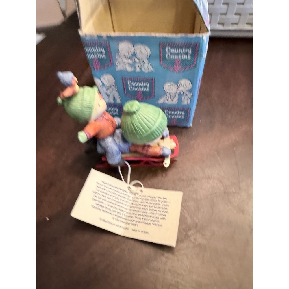Enesco Country Cousins on Sleigh E-6787